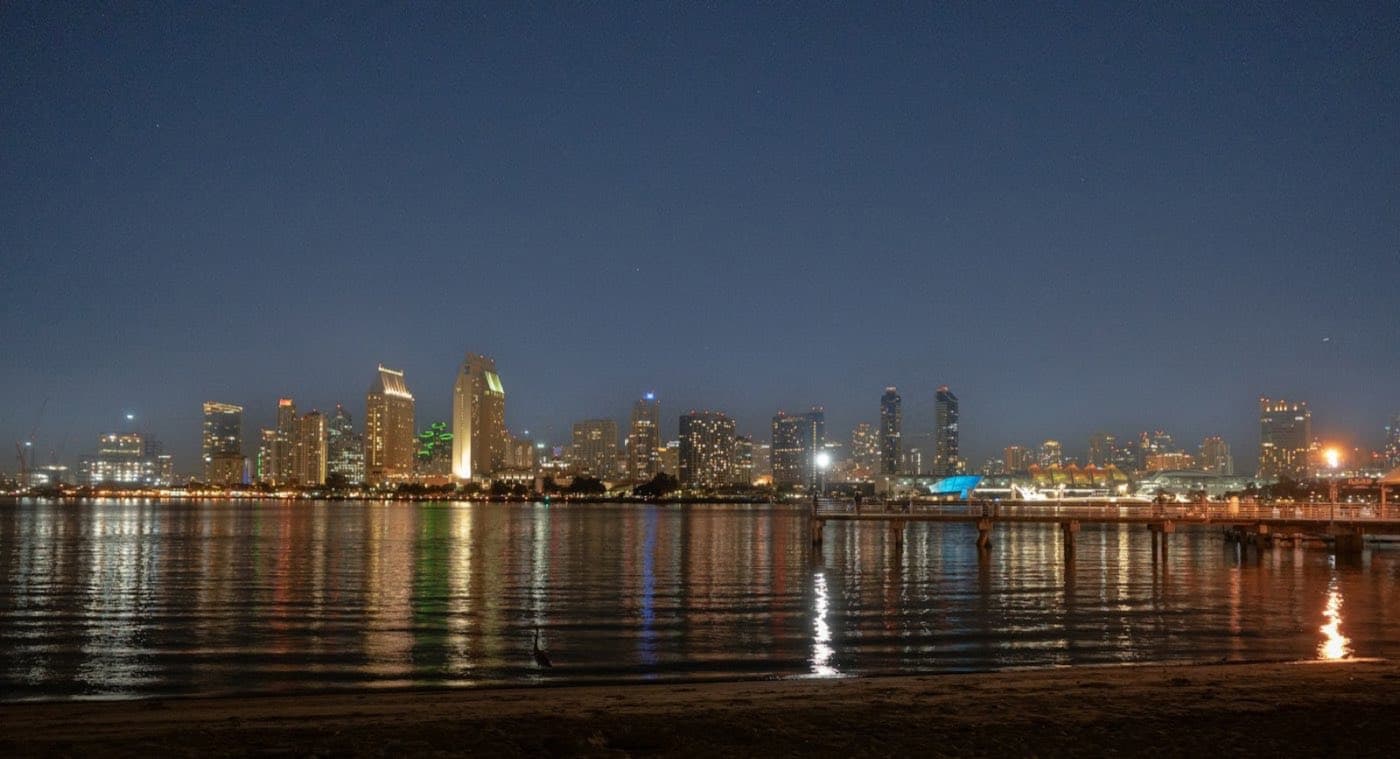 The San Diego skyline across the bay at night
